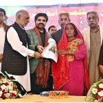 Sindh Minister for local government Syed Nasir Hussain Shah distribute ownership certificates among slum dwellers at SRTC ground.
