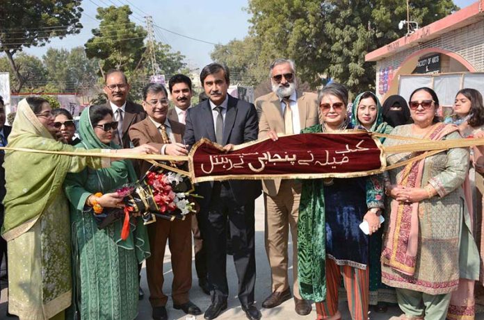 GCWUF Vice Chancellor Prof. Dr. Kanwal Ameen (T.I.) cutting ribbon to inaugurate the Punjabi Cultural Day and the 5th Annual Book Fair at Government College Women University Faisalabad (GCWUF)