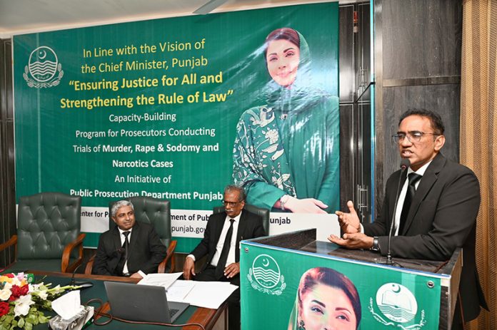 District Public Prosecutor Malik Amir Shahzad addresses a capacity-building seminar for prosecutors handling murder, rape, sodomy, and narcotics cases
