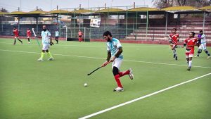 A view of the hockey match between Mardan and Mansehra teams at Qayum Sports Complex