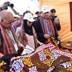 Female visit a stall at the Sindh Peoples Housing for Flood Affected (SPHF) project at village Himmatabad