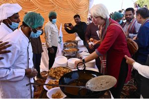 Female visit a stall at the Sindh Peoples Housing for Flood Affected (SPHF) project at village Himmatabad