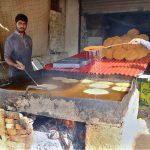 Customers crowd date stalls at Tower Market, a special item for iftar, as people prepare to break their fast ahead of the Holy Month of Ramazan