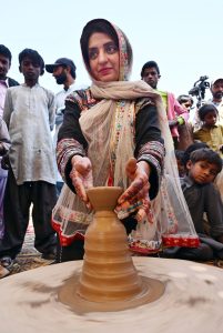 Female visit a stall at the Sindh Peoples Housing for Flood Affected (SPHF) project at village Himmatabad