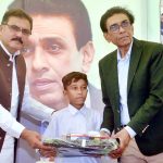 Federal Minister for Education and Professional Training Khalid Maqbool Siddiqui distributes teaching and learning materials and school bags among BECS learners during a ceremony at Benazir Bhutto Shaheed University, F.B. Area.