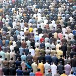 Muslim worshippers offer the first Friday prayers of the holy month of Ramazan at the historic Masjid Wazir Khan