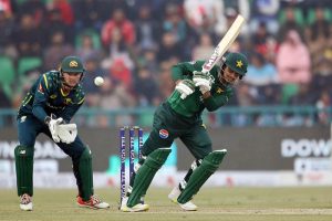 Australian players celebrate after the dismissal of Pakistan's (Salman Agha catch Green ball by Dwarshuis) during the third Twenty20 international cricket match between Pakistan and Australia at the Gaddafi Cricket Stadium