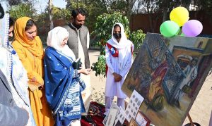 Director Colleges Naheed Naz and Principal Mrs. Muntaha Javed of Govt. Graduate College Farooq Colony visit a stall during the Fine and Arts Department exhibition at Govt Degree College Farooq Colony