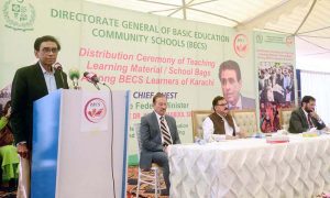 Federal Minister for Education and Professional Training Khalid Maqbool Siddiqui distributes teaching and learning materials and school bags among BECS learners during a ceremony at Benazir Bhutto Shaheed University, F.B. Area.