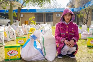 School children after receiving their part during Rashan Distribution by Allah Wale Foundation at National Special Education Centre for Hearing Impaired Children