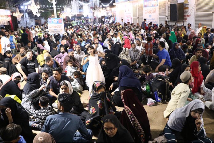 A large number of families during grant 'Sehri' on the holy fasting month of Ramzan ul Mubarak, free meal distribution by JDC Foundation Pakistan and Shamim Sheikhani Foundation Numaish Chowrangi