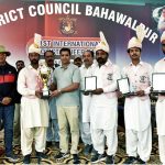 Assistant Commissioner Ahmedpur East Muhammad Naveed Haider , District Sports Officer Fawad Anwar and others is giving Cash prize to the winning players team of tent pegging competition match at the 21st PTDC Cholistan Desert Rally 2026 at Dilwash Stadium