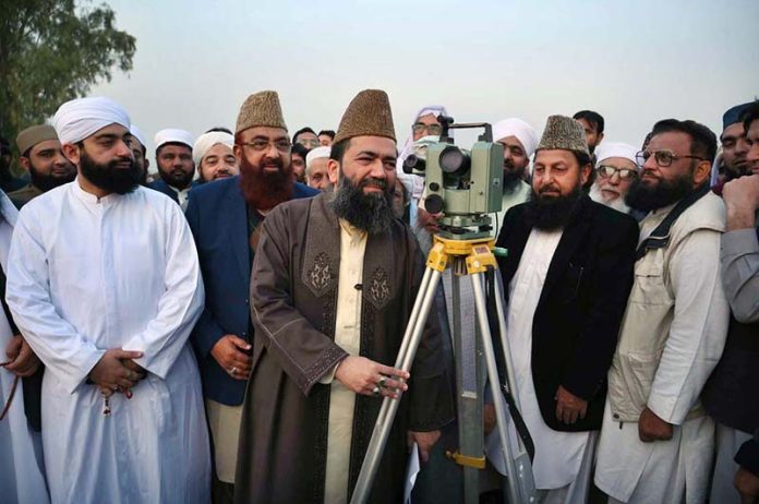 Chairman of the Ruet-e-Hilal Committee, Molana Abdul Khabir Azad, along with committee members, sighted the Ramazan moon at Eidgah