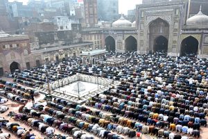 Muslim worshippers offer the first Friday prayers of the holy month of Ramazan at the historic Masjid Wazir Khan