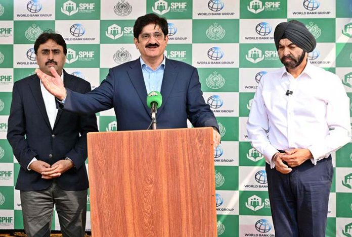 Sindh Chief Minister Syed Murad Ali Shah and President World Bank Group Ajay Banga talking to media persons during ceremony to hand over house documents to flood affectees which newly constructed under the Sindh People’s Housing for Flood Affectees program