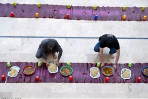 A volunteer distribute Dates in Iftar during the Holy Fasting Month of Ramzan at Muhammadi Masjid.