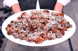 A volunteer distribute Dates in Iftar during the Holy Fasting Month of Ramzan at Muhammadi Masjid.