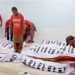 Dead bodies of the victims of an accident on a highway involving a passenger bus and a truck. At least 12 people, including women and children, are dead and several others injured in a multi-vehicle collision involving an oil tanker, a passenger bus, and other cars near Kathore.