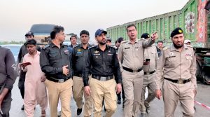 Dead bodies of the victims of an accident on a highway involving a passenger bus and a truck. At least 12 people, including women and children, are dead and several others injured in a multi-vehicle collision involving an oil tanker, a passenger bus, and other cars near Kathore.