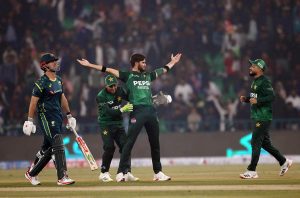Australia's batter Mitchell Marsh bowled out by Shaheen Afridi during the third Twenty20 international cricket match between Pakistan and Australia at the Gaddafi Stadium