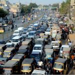 Vehicles stuck in a massive traffic jam near the President’s Parking Plaza, reflecting the growing congestion in the city
