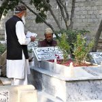 People recite the Holy Quran and offer Fatiha at the graves of their relatives on the occasion of Shab-e-Barat.