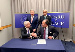 GSA Administrator Edward C. Forst on behalf of the United States and Federal Minister for Finance and Revenue Senator Muhammad Aurangzeb on behalf of Pakistan signing a Memorandum of Understanding , witnessed by Prime Minister Muhammad Shehbaz Sharif and United States Special Envoy Steve Witkoff