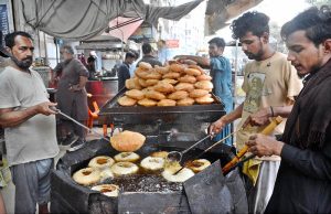 Workers busy in preparing vermicelli (Pheoni) ahead of Ramadan-ul-Mubarak at his workplace near Bakrani Road.