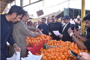 Federal Minister for Parliamentary Affairs, Dr. Tariq Fazal Chaudhary, speaks to the media during his visit to G-6 Ramzan Bazar
