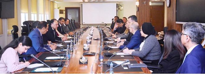 Federal Minister for Finance and Revenue, Senator Muhammad Aurangzeb, chairing a meeting with a high-level international investors delegation comprising representatives of the International Finance Corporation (IFC), British International Investment (BII), Asian Development Bank (ADB), and Baltoro Capital at the Finance Division