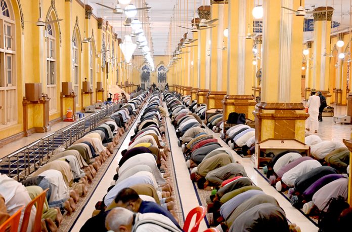 Faithful offer Tarawih prayers at New Memon Masjid after sighting the moon of the holy month of Ramazan