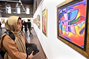 Visitors observe intricate artworks at the calligraphy exhibition “ABJAD 26” by Dr. Mahmood Nasir Malik at NCA Tollinton Block.