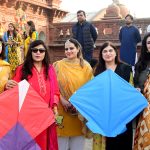 Female teachers participating in the Basant Festival organized by Punjab University College of Art and Design hold kites during the festival’s return to the provincial capital after the ban was lifted after two decades