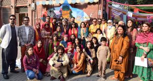 Female teachers participating in the Basant Festival organized by Punjab University College of Art and Design hold kites during the festival’s return to the provincial capital after the ban was lifted after two decades