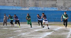 District Public Prosecutor Malik Amir Shahzad and District Sports Officer Madam Saima Manzoor present trophies to the winning team during the Different Games event.