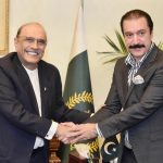 President Asif Ali Zardari shaking hands with Raja Faisal Mumtaz Rathore, Prime Minister of Azad Jammu and Kashmir, at Aiwan-e-Sadr.
