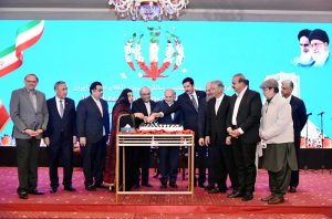 President Asif Ali Zardari, accompanied by Faisal Karim Kundi, Governor Khyber Pakhtunkhwa; Syed Mehdi Shah, Governor Gilgit-Baltistan; Jam Kamal Khan, Federal Minister for Commerce; Ambassador of Iran, Dr. Reza Amiri Moghaddam, and other dignitaries, cuts a cake at a reception to commemorate the 47th Anniversary of the Victory of the Islamic Revolution of Iran and Iran’s National Day
