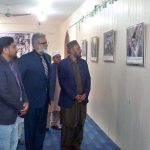 Bahawalpur Arts Council Kashmir Solidarity Day photo exhibition opening ceremony, Member Islamic ideological Council Pakistan Malik Allah Bakhsh, renowned educationist Amir Awan and other are looking at the photos in the photo exhibition