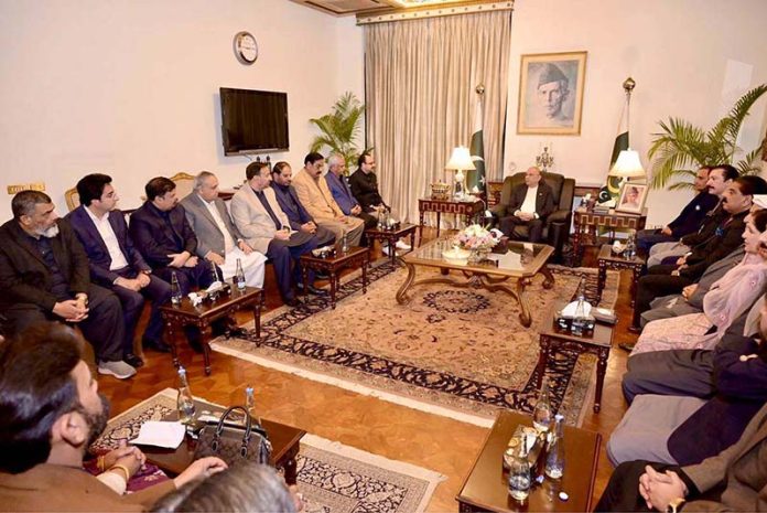 President Asif Ali Zardari and the Azad Jammu and Kashmir parliamentary delegation offering Fatiha for the late Barrister Sultan Mehmood, former President of Azad Jammu and Kashmir