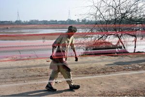 A vendor making kite strings by applying manja as Punjab government announces the celebration of the traditional event Basant 2026