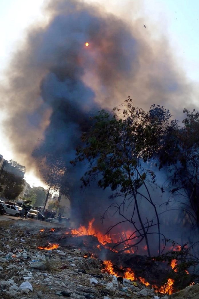 A fire broke out in dry weeds on an empty plot near Gulshan-e-Iqbal 13-D. A vehicle and other items were damaged in the incident