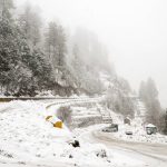 Roads open as Murree records fresh snowfall; police advise caution