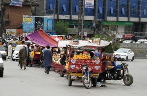 Fruit sellers have encroached onto the road at Khanna Pul Bridge, disrupting the smooth flow of traffic and causing inconvenience to commuters. The situation demands immediate attention from the concerned authorities.
