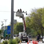 Workers are seen busy installing security cameras in Bhara Kahu to enhance surveillance