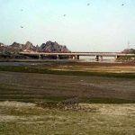 A view of the dried bed of the Chenab River in Chiniot due to water shortage, creating difficulties for the agricultural sector
