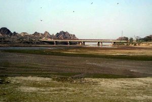 A view of the dried bed of the Chenab River in Chiniot due to water shortage, creating difficulties for the agricultural sector