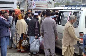 People are arriving at the General Bus Stand in Pirwadai to travel to their hometowns and celebrate Eidul Fitr with their loved ones