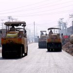 Heavy machinery being used for construction work during the ongoing development project on Vehari Road