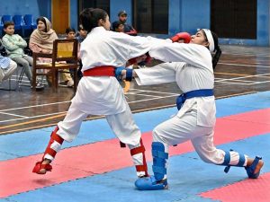 Karate Players lock in fierce combat during the Karate Championship organized by the Sports Department Sargodha as part of the Ramazan Night Sports Festival at the Sports Gymnasium, held on the instructions of Deputy Commissioner Hussain Ahmed Raza.