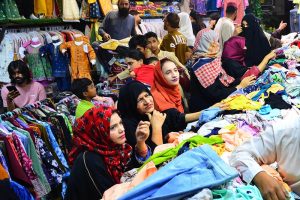 A large number of women busy shopping at a local market ahead of Eid-ul-Fitr.